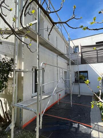 Rénovation d'une villa en enduit taloche lisse à Juvignac
