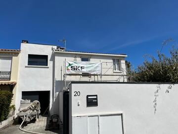 Rénovation d'une villa en enduit taloche lisse à Juvignac